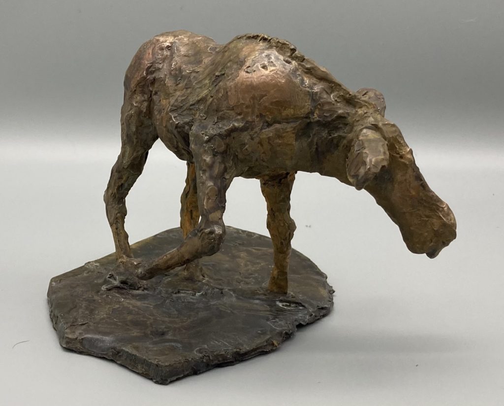 Moose leaning in Bronze